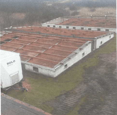 Luchtfoto van daken in een waterwingebied tijdens de sanering